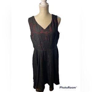 Noctflos black lace dress with a beautiful red liner. NWT​